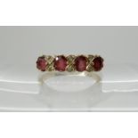 A 9ct ruby and diamond ring, size K, weight 2.7gms Condition Report: Available upon request