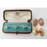 A pair of 9ct gold G.H Johnson cufflinks weight 11.6gms and a boxed set of three 18ct gold studs 2.