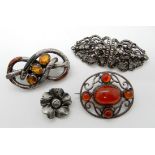 A silver carnelian set brooch, a silver Deco clip, a Scottish agate brooch etc Condition Report: Not