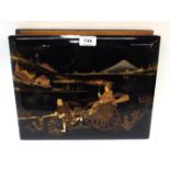A Japanese lacquered photograph album containing photographic prints of temples, Mount Fugi and