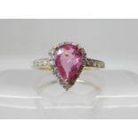 A 9ct gold pink sapphire and diamond ring finger size O, sapphire approx 7.5mm x 6mm x 3mm, weight