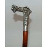 A walking cane with white-metal handled formed as a resting cherub Condition Report: Available