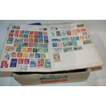 A stamp album and collection of loose stamps Condition Report: Available upon request