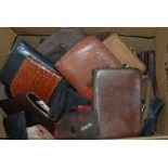 A collection of leather and other wallets and purses etc Condition Report: Available upon request