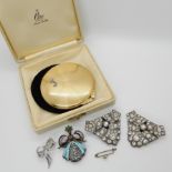 A Ciro compact in original box, a silver and enamel brooch and other items Condition Report: Not