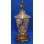 A Bohemian amber flashed and checkerboard cut glass and cover, 26cm high Condition Report: Nice
