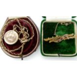 A 9ct gold red gem and pearl brooch together with a yellow metal (B&F) locket with 9ct vintage fancy