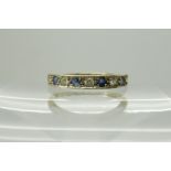 A 9ct gold sapphire and diamond half eternity ring, size M1/2, weight 1.3gms Condition Report: