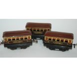 Three Hornby tinplate coaches, tinplate wagons, signals etc Condition Report: Available upon