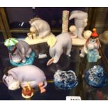 Two Lenox Disney Showcase porcelain Eeyores, four Pooh and Friends Eeyore figures and two glass