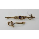 A 15ct gold amethyst and pearl brooch length 6.3cm, weight 6gms, together with a yellow metal