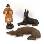 A Royal Doulton figure Lambing Time, together with two dog models Condition Report: All items