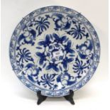 A large blue and white Chinese charger decorated with butterflies, 34cm diameter Condition Report: