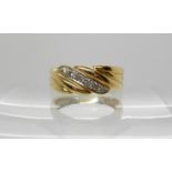 An 18ct gold diamond set dress ring, size L1/2, weight 3.5gms Condition Report: Available upon