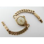 A 9ct gold ladies Majex wristwatch, length of strap 16cm, weight including mechanism 14.2gms