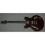 A Vantage six string electric guitar and a novelty acoustic guitar (2) Condition Report: Available