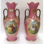 A pair of Victorian twin handled pink ground vases with painted panels of figures in landscapes,