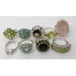 A collection of silver and white metal rings to include, rose quartz, peridot etc Condition