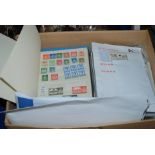 A collection of stamps albums and loose examples Condition Report: Available upon request