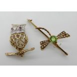A 9ct gold diamond and ruby set owl brooch, length 3cm, together with a 9ct gold pearl and green gem
