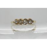 An 18ct four stone diamond ring estimated approx diamond content 0.40cts, size Q, weight 2gms