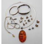 A large silver mounted amber pendant, earrings, pendants etc Condition Report: Not available for