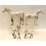 Four Beswick dapple greys including Connemara, stallion and two foals Condition Report: Stallion -