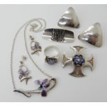 A silver Caithness glass brooch and ring, an Ortak iris flower necklace with matching earrings and