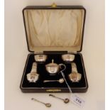 A cased five piece silver condiment set, probably by John Charles Lowe, Birmingham 1938 with a