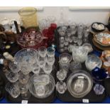 Six Waterford water glasses, other crystal, cranberry glasses, a part suite of fine cut glasses