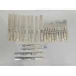 A twenty four piece EP and mother of pearl handled fruit cutlery set (loose) Condition Report: