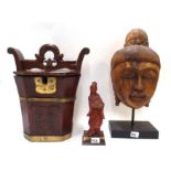 An oriental food carrier, a Thai carved head and a carved wooden figure Condition Report: