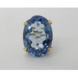 A 9ct gold large blue gem ring size N1/2, weight 11.4gms Condition Report: Available upon request