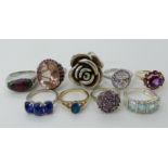 A collection of silver and white metal rings to include, kyanite, opal triplet, amethyst etc