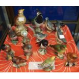 A collection of Beswick birds including Thrush, Lapwing, Nuthatch, Robin, Wren etc Condition Report: