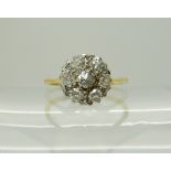 An 18ct gold diamond cluster ring, set with estimated approx 0.40cts finger size M, weight 2.4gms