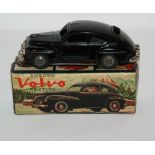 A Sweden Volvo friction car in original box and a Schuco Telesteering Car in original box and