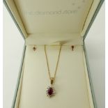 A 9ct gold ruby and diamond pendant and chain with matching earrings, length of pendant 1.7cm, chain