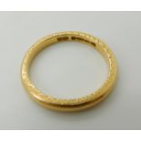 A 22ct gold wedding ring size L1/2, weight 3.3gms Condition Report: Available upon request