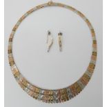 A 9ct gold three colour gold fringe necklace with matching earrings, weight approx 29.4gms Condition