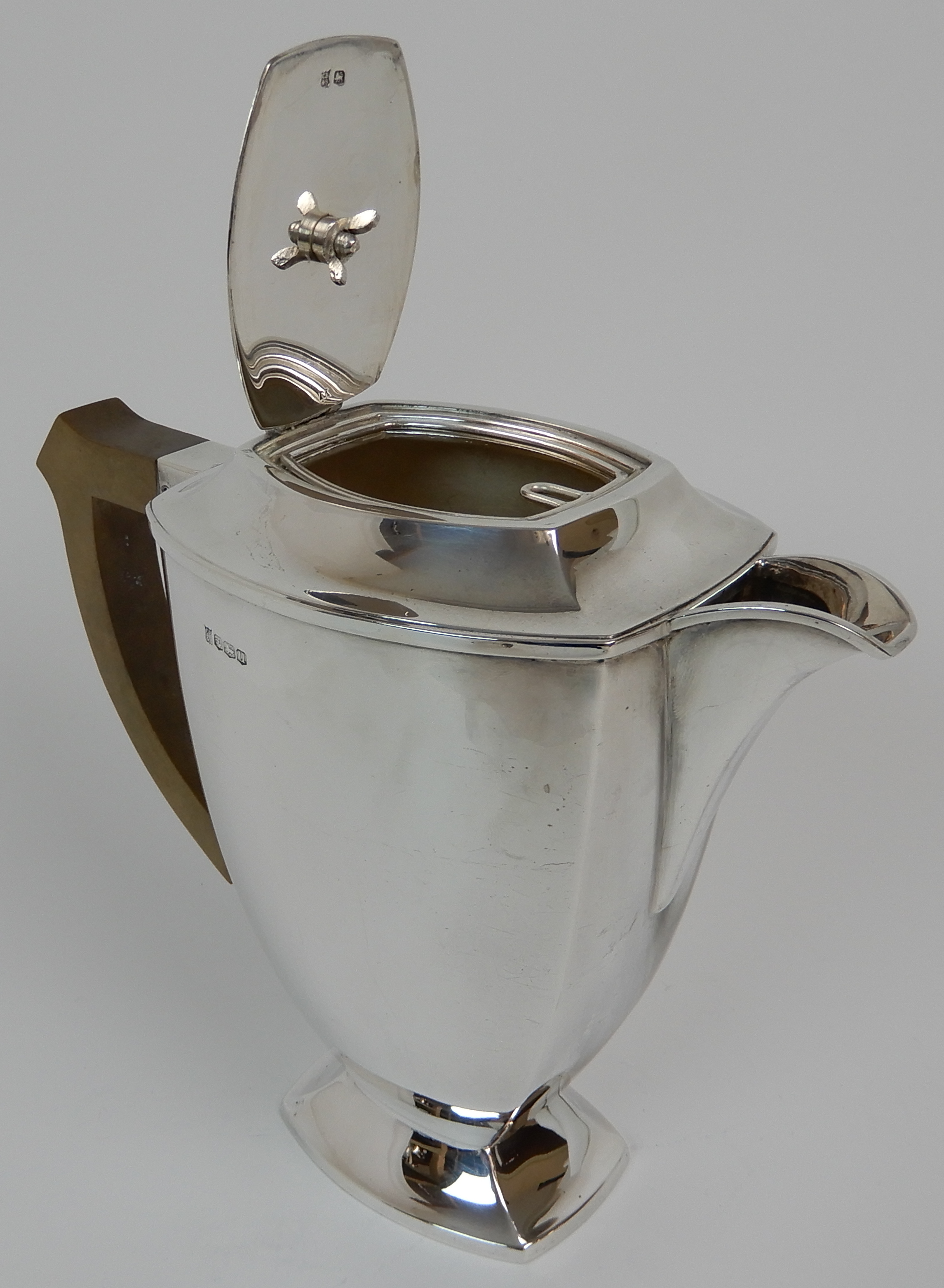 A FOUR PIECE SILVER TEA SERVICE by Cooper Brothers & Sons Limited, Sheffield 1936 and 1937 of - Image 9 of 10