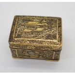 A JAPANESE KOMAI SMALL BOX the hinged cover decorated with buildings in a mountainous landscape, the