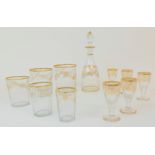 A PART SUITE OF GEORGIAN DRINKING GLASSES including five graduated tumblers, a liqueur decanter, and
