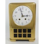 A LENZKIRCH AESTHETIC DESIGN BRASS CASED MANTLE CLOCK the front of the case with eight glass