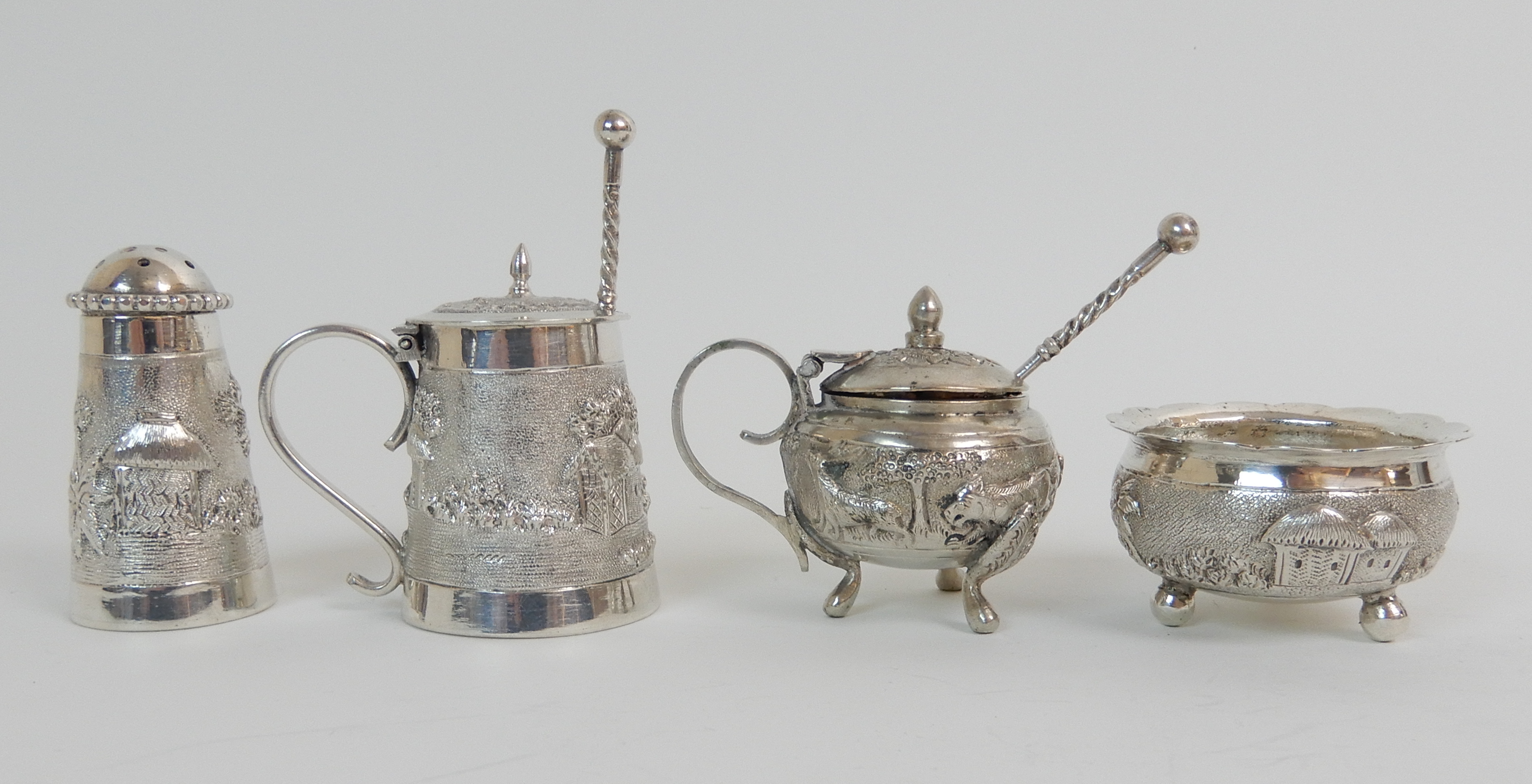 FOUR BURMESE EXPORT SILVER CONDIMENTS comprising two mustard pots, a salt and a pepperette with - Image 3 of 6