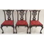 A SET OF EIGHT CHIPPENDALE STYLE MAHOGANY DINING CHAIRS (two carvers and six chairs) with pierced