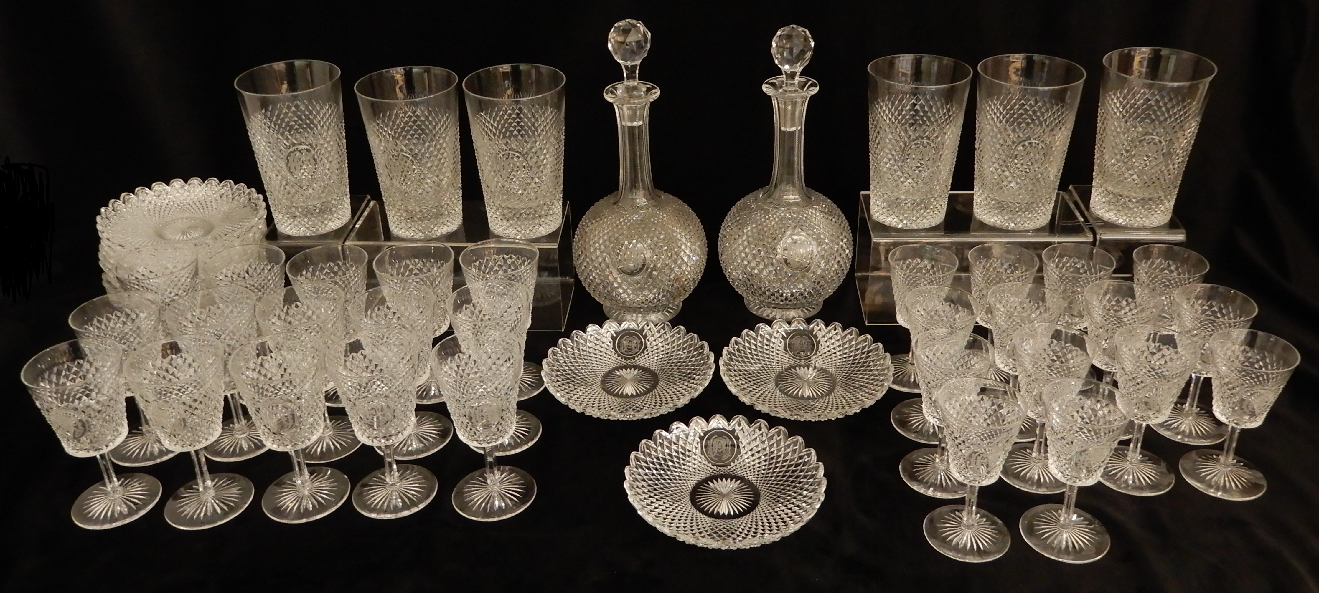 A SUITE OF LATE 19TH CENTURY DIAMOND CUT CRYSTAL comprising six large tumblers, 14.5cm high, fifteen
