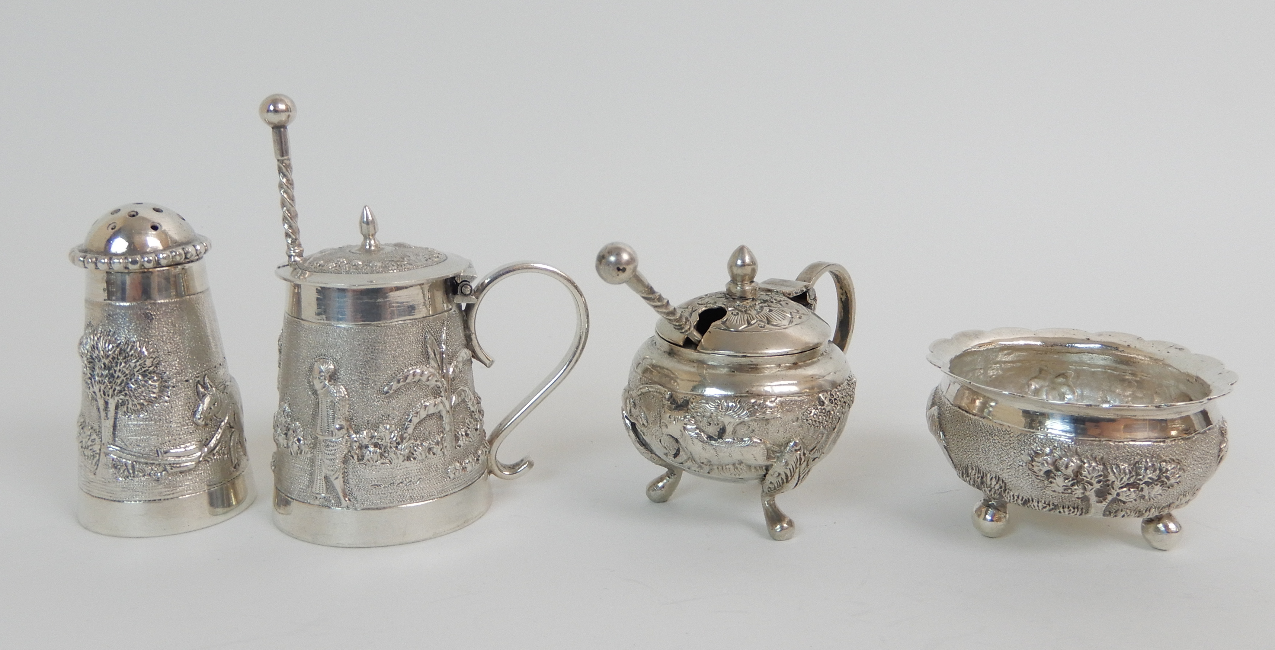 FOUR BURMESE EXPORT SILVER CONDIMENTS comprising two mustard pots, a salt and a pepperette with - Image 4 of 6