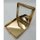 A 9CT GOLD LADIES COMPACT WITH LINEAR ENGINE TURNED DECORATION made by Elisha & Harmsworth, London