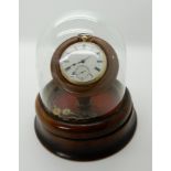 AN 18CT GOLD OPEN FACE POCKET WATCH IN GLAZED DOMED CASE the pocket watch with white enamelled